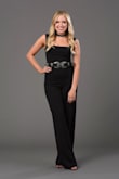 I bought this jumpsuit specifically for a photoshoot for work and couldn't have been happier with the fit. It slims you in the waist, but the wide leg is a cool detail! I love to throw a chunky belt around the waist, but it looks great without as well. If you're 5'3 like me definitely plan to wear heels with this! - Morgan M.