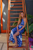 I saw this and immediately new I wanted it but wasn't sure how I would feel about a two piece situation. When I got it, I immediately tried it on and it could not have fit better and it looked AMAZING on! Seriously, it was so flattering, almost more so than any other maxi dress that I own and I didn't even feel like I was revealing too much with the midriff showing. So chic, so effortless, so fun! I wore it on a girls trip and felt like a goddess- definitely one of my favorite pieces I own now. - Cayley B.