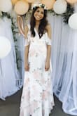 I wore this dress for my bridal shower and it was perfect! The way it fit made me feel confident and elegant. It even photographs beautifully. I couldn't have chosen a better dress to wear for my special day. - Catherine O.