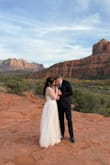 Wore this dress for our elopement in Sedona on 11/11 and it was stunning! The corset detailing is so beautiful! And I loved the white over the more ivory/beige inner lining. I did want a more conservative look and I love a turtleneck so I added the bolero. Only thing I didn't like that much was the breast cup - could've had more support but may work better for smaller breasts. Felt more expensive than what I paid for it! - Jeanette L.