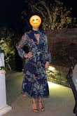 The dress is so elegant that it received many compliments through the night. It fits perfectly fine and the measuring by the website was helpful. - Garine E.