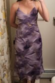 I am 5'9" with measurements 35-28-39" and am wearing a small. (Size chart says I should be a medium but that was WAY too big). I ended up returning this dress because the unfitted/loose waist was not flattering on my pear shape body. It made my waist look way wider than it is. My mom also noted the dark spot right on the crotch...awkward! - Tristan L.