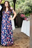 When my friend announced she was getting married I started looking for the perfect dress to wear for her outdoor spring wedding . I saw this dress and decided to purchase it after carefully reading the reviews, I ordered a size down(M) I usually wear a L. The fit was great but the neckline was pretty low. I bought fabric tape strips to keep it from exposing my breasts but other than that I really love the dress and so does my bf. I got compliments all day. *it is a bit long so wear high heels . - Rocio O.
