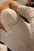 This is my dress I will get married in! The detailing is absolutely stunning, there is grip in the bra area to hold it up, with a small pad for the girls. It is very long but nothing a hem can't fix! The champagne under tone really makes it pop! I do think this is a true white color. BUY THIS DRESS!!!! It's elegant and sexy! The sweetheart neckline is perfect and the mesh between the cleavage is actually very nice. Quality is great, feels amazing. Cannot beat the price! I am completely obsessed with this dress. I added sleeves from amazing for a complete look for under 200$ - Renee N.