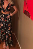 This was a great buy. The skirt has a stretchy back so it fits snug, but not uncomfortably. The top has a tie front which is nice to add a little skin. Great buy! - Katherine M.