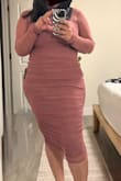 The material of the dress is very stiff, feels like paper almost. Love the design just not the fabric. Unfortunately now they charge a fee for returning dresses unless you get store credit. - Stefanie