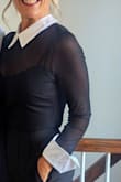 I purchased this blouse and received lots of compliments.   I saw it on an influencer and loved it.  I'm 55 years old and feel confident in it 
Thank you, Lulus - Cathy H.