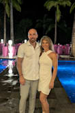 The dress is beautiful and flattering with a unique cut and design. The material is thick and in no way see through which is sometimes the case with white clothing. I found it to run a tad small but I think it's because the dress has zero stretch to it but I would have not changed the size because I felt the small looked good and it was comfortable - Crystal B.