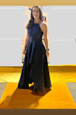 Had to have the dress hemmed a little since it was still long with my heels on and I didn't want the dress to drag on the ground. Loved the pockets and received many compliments on the dress at the fundraising gala. The dress was very fitted, but in all the right ways. - Michelle W.
