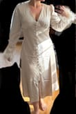 I love love love this dress! Fits my shape so well. It can be hard to find a dress that fits my hip-to-waist ratio, and I feel like this one does. Great for a smaller waist to wide hip gal. The feathers are so fun too and look like nice quality. Can't wait to steam it and dress it all up. I'm 5'5, 171lbs, 36D, 30" waist, 41" hip. - Kaitlyn O.