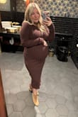 I ordered a Medium when usually I'm a Large but wanted a nice shape around my growing bump! Very stretchy and comfortable. I'm short so I was worried it would hit too low, but was the perfect midi length. Very thick material, in a good way, but keep that in mind for inside events. I felt so cute & got lots of compliments. - Taylor M.