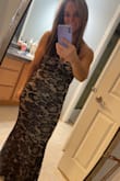 I received so many compliments in this dress. It is unique and timeless. Snags easily, and it is a little tight, but it's worth being a little careful and keeping perfect posture for the evening. It's just a gorgeous dress - Kristen P.