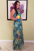 This dress is absolute perfection. The colors are so vibrant, the dress flows perfectly, and it's an incredible addition to my wardrobe! I wore it to a luau party and will wear it again on my honeymoon in the Dominican Republic this summer. A must have dress! - Gisela G.