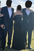 This is a perfect wedding dress. It fits tight, but I would not change the size. I ordered a medium. I am 5'5" and weigh 150lb. It is long, so you must wear heels. Quality is good. I got a lot of compliments on the dress. I danced all night in it with no issue. I felt great in it. I would recommend this dress to anyone. - Tania S.