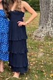 I love this dress (once I got the sizing right)!! It does run small in the bust. I normally wear an XS in Lulus, but I had to reorder this one in a small for a better fit. It's also pretty long, I ended up having about 5 inches hemmed. - Cameron G.