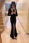I wore this dress as a wedding guest and absolutely loved it. I'm 1.65 m (5'5), 60 kg, and wore a size M, true to size, slightly stretchy, and very flattering on the waist, hips, and bust.

The fabric is soft, not see-through, and moves beautifully when walking or dancing. The slit adds a stylish but classy touch, and the neckline stays in place without tape. I received many compliments throughout the evening.

The length was slightly long, even with 3 cm heels, but still elegant. It photographs beautifully and is perfect for weddings or evening events. Highly recommended. - Rita D.