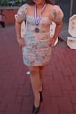 I fell in love the first time I saw this dress, I got for my daughter and she used it for her high school prom, she looked beautiful with this dress and received a lot of compliments, the material is a little bit kind of not so soft but my daughter loved it, it's a short dress. - Evelyn R.