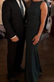 Dress fit perfectly. Quality material, was thick enough for a cold November wedding. Complemented my figure and received many compliments on the dress. - Cynthia F.