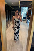 Beautiful black and white dress. Strechy fabric, ordered a medium but changed it to a small for better fit. Very fast service on the exchange. The dress looked beautiful and was very comfortable. - Ana A.