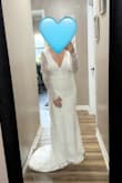 I thought the dress was gonna be crazy long, and it's not. With heels or some sort of elevated shoe, it'll be about perfect. I do have to have the back hemmed as it gapes open for me, but it'll be easy to do. I have a short torso, which is probably why. She's perfect, and I'm genuinely obsessed! - Cassie M.