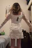 I bought this dress for my wedding. I'm planning to get married at the courthouse, do a photoshoot with my partner and our families, and then do a small celebration, probably at a restaurant. I think this dress is perfect for the occasion, however, two things to note, if you usually wear Small or Medium, I'd say, go for the Medium, I went for small, but my back and chest feel too tight, not enough to return the dress, but I'm a little concerned about how comfortable I will be on my day, so I'm still debating if this will be the dress I will wear. And the other thing, the material doesn't stretch at all, so it's not that comfortable to sit down or lift your arms to dance or hug people. Overall, I would recommend it, just note some things and make your decision. - Maria F.