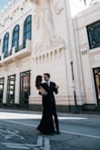 It's a little tight (took a minute to take off) but it's absolutely stunning. I wore it for my engagement pics and it was the perfect dress. The open back is really cute! I'm 5'4 so it was a tad long even with heels on, but I loved it so much that it didn't matter. - Morgan S.