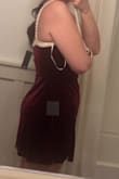 I was suspicious of this dress. I got a bit of an apron belly so tight and short don't work that well for me. Let me tell you, I absolutely love this dress. To me it looks like red version of the dress from my date with the presidents daughter. Also the top is a silky antique white/beige. It's ways prettier than I expected. Another thing that shocked me was I don't need a bra with this dress and I'm not wearing one in the picture. - Savannah B.