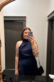 I have a very large rib cage, but this dress worked well! The asymmetrical neck is interesting. The material looks good after a quick steam, and I didn't have to wear a bra! - Caroline W.