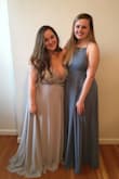 This dress is fantastic! The color is gorgeous and it fits true to size. It was a bit longer than I anticipated, but with four inch heels I was fine. Definitely would recommend! - Alexa O.