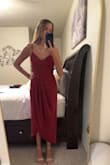 The dress was pretty, I didn't find it as flattering as I was hoping for, that's a me thing. The color is beautiful. Dark red wine - Angie F.