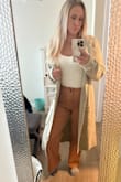 This fits perfectly! I love that you can dress it up or down, and the material is super soft! Highly recommend - Aria F.
