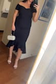 This dress fit perfectly. The material is soft and there's some stretch! - Jaclyn H.