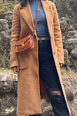 Love this coat, have worn it all over. Not the heaviest, but it's roomy enough for layering! - Elena D.