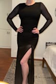 Cute and fits well. Modestly covered everything but is still sexy with the sheer sleeves and bottom. I didn't keep it because it wasn't a "wow" from me, but a friend of mine loved it and wore it for our company holiday party. - Haley R.