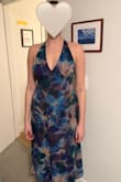 I wanted to love this dress, but the top does not fit well at all. The bust is way too high on me compared to the model, and without adjustable straps, it won't come down. The rest of the dress is fine, but I will definitely be returning it. - Michelle B.