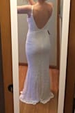 After the dress I ordered from a bridal shop arrived and was a complete disaster, I turned to Lulus. This dress is the exact cut and fit that I was looking for. The fabric is stretchy, so it is very comfortable to move in. The lace is forgiving and camouflages any bumps/dimples. I don't find it to be see-through. The length is perfect for my height. It just brushes the floor when I'm in 3'' heels. (Not wearing shoes in the photo.) - Ali E.