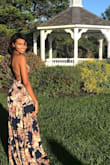 This dress is absolutely beautiful and fits perfectly because of the tie straps. It flows wit the wind and is great for special occasions . I wore it to wedding and it was definitely a show stopped . Can't wait to wear it again. - Jessica J.