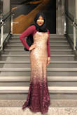 It's such a beautiful dress! I've gotten so many compliments from it and I'm so glad I bought it. It does run a little longer as I'm about 5'2 inches so I would have to wear a really high heel to make up for it. I also sized up cause I have large tights and a medium fit me perfectly! - Maryam B.
