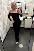 This fits like a glove! So sexy and classy. Absolutely loved! Received so many comments! The clever material was beautiful. It does have some stretch and was perfect for so many occasions! The off-the-shoulder is beautiful and stayed in place. Never once slipped past my shoulders! - Michelle C.