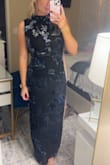 A weird material but is really cute! A little tight around my ribs but still cute - Aspen Y.
