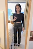 I finally have my faux leather pant that I had been looking for! I am super short, so that is always a struggle. I am 5'0. The pant does fit longer than how it fits on the model. It fits on me like regular, slightly flared, bootcut jeans. The waist and hip areas fit like a dream. There is some stretch to these as well. - Sodelba A.