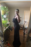 I was going to wear this dress to a wedding. I bought two dresses from Lulus, and I loved the other dress more. From the sides, I love it. From the front, I think it's okay. I feel a lot sexier and beautiful in the other dress I bought. It is long on the bottom. - Maimouna D.