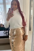I absolutely loved this skirt! Purchased it for family holiday photos and she's a stunner. Great length for what I wanted, & a perfect fit. Not too tight or too loose. I am 5'5 and fall between the range of 180-190 most of the time. - Raven M.