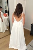 The item details say the bow is detachable. Although it is detachable, you cannot wear it without the bow as the snaps are still visible on the back. 

This dress is very poor quality and i would not recommend anyone order it. I was very surprised that Lulus would even sell this item. Save your time & money. - MaryKate C.