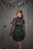 I got this dress for my witchy cocktail birthday party. It was the perfect fit for the theme. The dress is a little low cut, and I did have one nip slip, and the material does not have any stretch to it. However, it makes up for it with the beautiful detailing and sculpting fit!! - Sierra F.