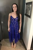 This dress fits very nicely. It is a little longer than I'd like but since it is flowy and has the separate lengths it looks good! - Eva U.