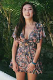 The material is very flowy and soft, which is perfect to combine with the featherlike pattern. Fits very well, I can wear a bra under without showing the stripes. The entire romper is so so flattering! - JingJing T.