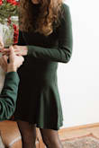 I bought this for a Christmas photoshoot [and got engaged in it lol] and it fit like a dream! I was worried about it being too short, but the length was great. Super comfortable and well made! I was warm and cozy and still got the exact fit I wanted with the xxs. (hips are 31", but that wasn't available as an option. Other measurements accurate) - Olivia M.