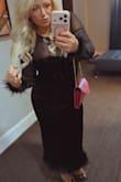 I wore this to a company holiday party and I received several compliments. The material is soft and stretching. I would recommend! - Samantha