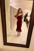 The dress is stunning. It has the right amount of stretch, and the velvet is such a beautiful red. I wore it to my husband's company holiday party and have never received so many compliments! I wasn't sure what size to get and went based off of the recommended size based on my measurements. I feared it would be too small, but it was perfect! The arms were a little tight but not uncomfortable, if anything, it kept the dress in place all night. Would definitely buy again. - Stephanie K.